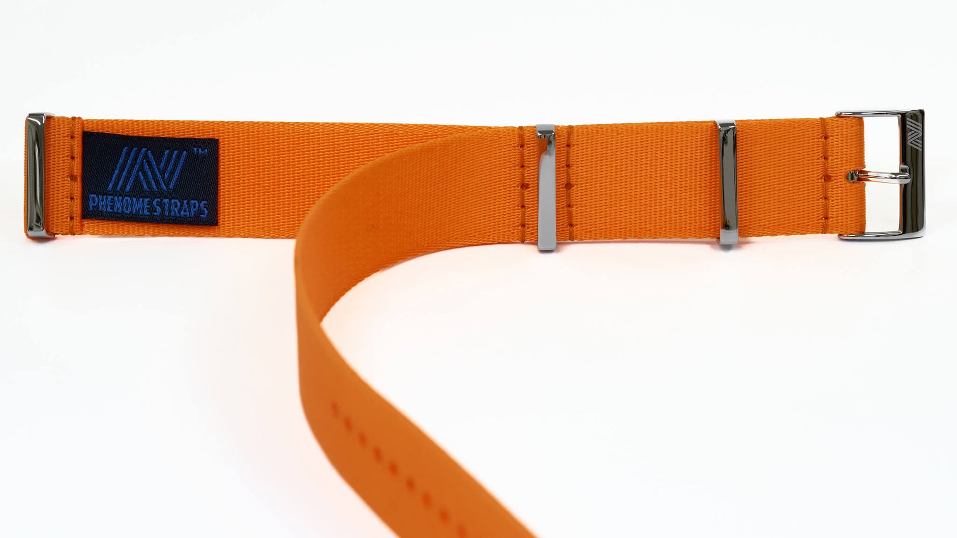 Orange watch strap with polished hardware on a white background